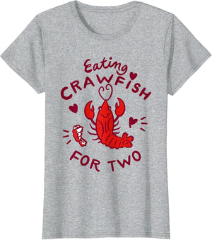 Eating Crawfish for Two Crawfish Boil Pregnancy Announcement