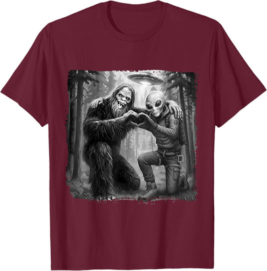 Alien with Big Foot UFO Forest Funny Friend Heart Hand Sign T-Shirt - T-Shirt | Maroon