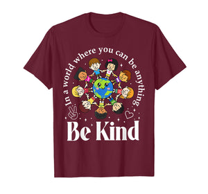 in A World Be Kind Kids Earth World Kindness Day Teachers T-Shirt