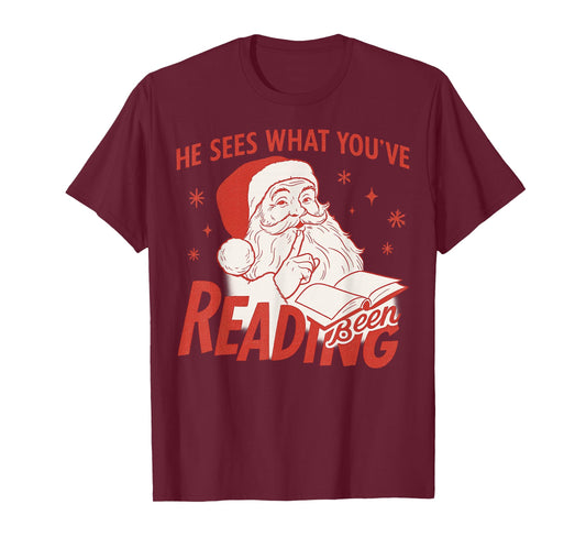 He Sees What You’ve Been Reading Funny Bookish Santa Xmas T-Shirt