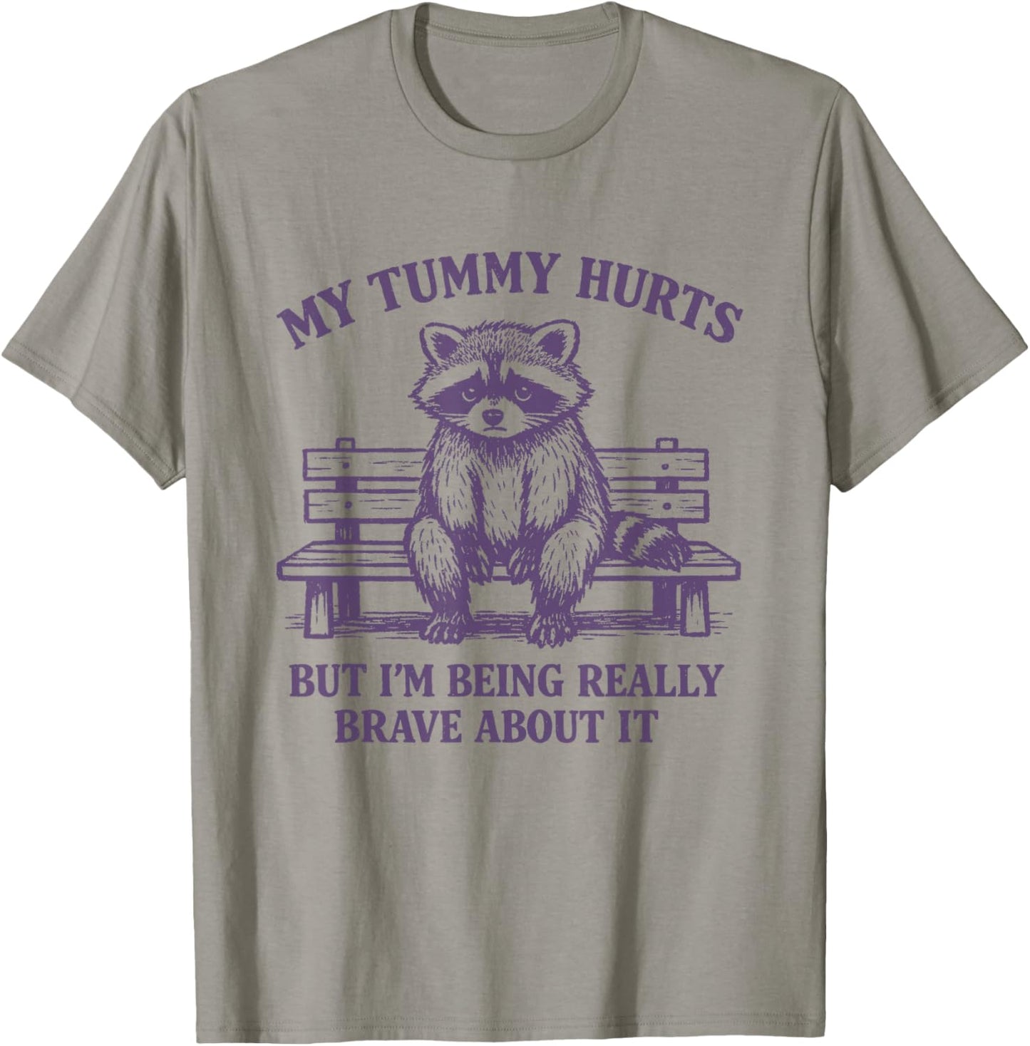 My Tummy Hurts But I'm Being Really Brave About It Raccoon T-Shirt - T-Shirt | Sand