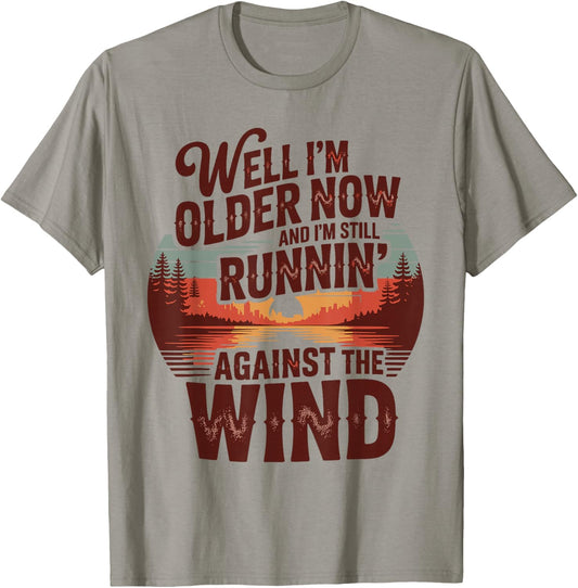 Well I’m Older Now But I’m Still Running Against The Wind T-Shirt - T-Shirt | Sand