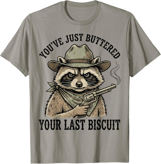 Raccoon You've Just Buttered Your Last Biscuit Cowboy T-Shirt - T-Shirt | Sand